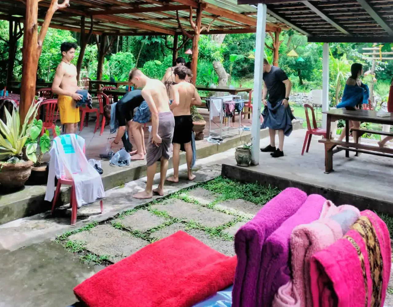 The open-air restaurant at the finish point with fresh towels laid out for guests